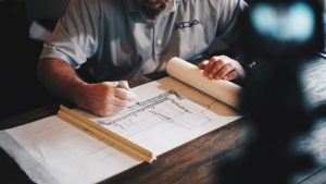 Architect drafting, Photo by Daniel McCullough on Unsplash